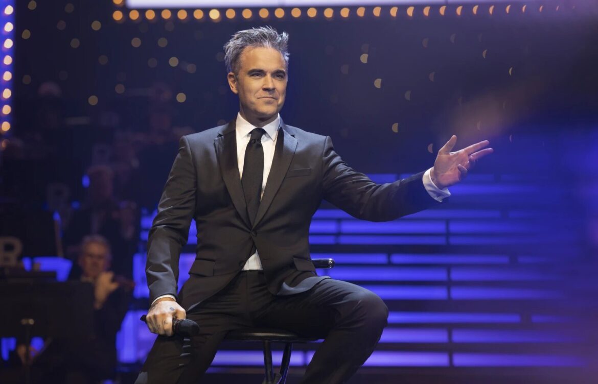 Robbie Williams se reinventa como un chimpancé en su biopic surrealista «Better Man»